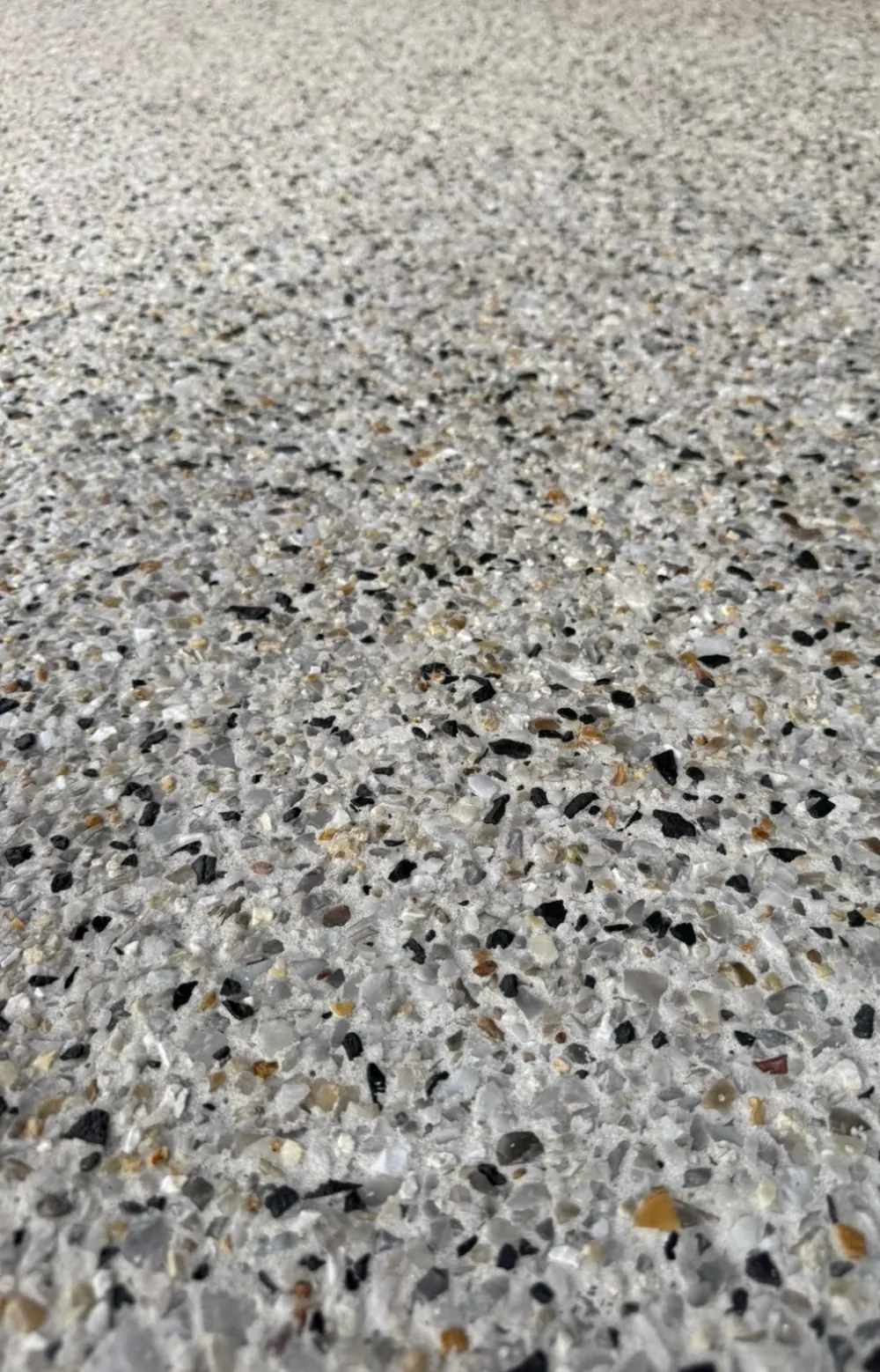 Close-up of exposed aggregate, stones showing in the cement